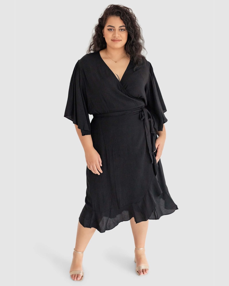 Front of a model wearing a size 14 Gabrielle Short Sleeve Wrap Dress in Black by Dani Marie US. | dia_product_style_image_id:233368